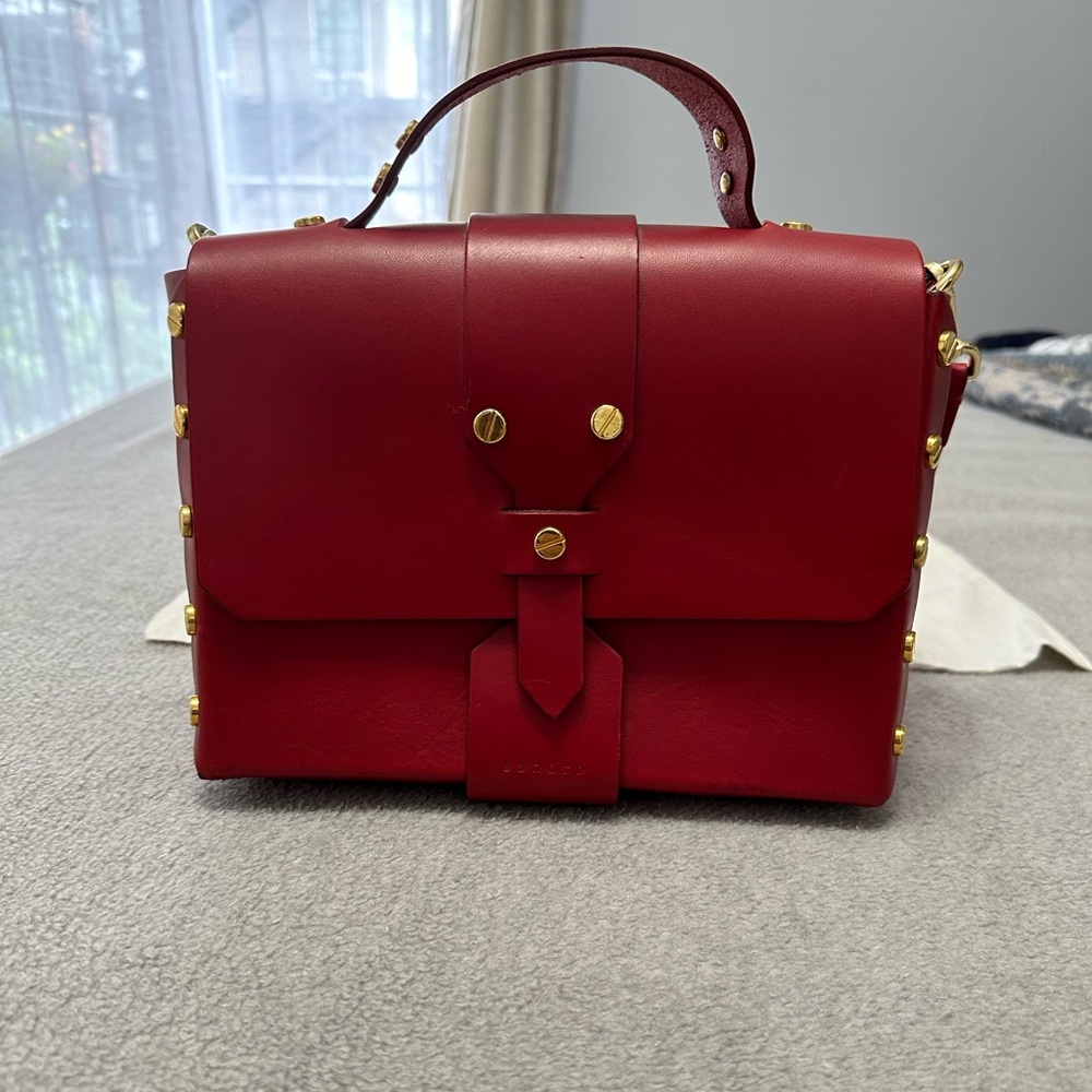 Sandro Top Handle Bag
Red Leather, Gold-Tone Hardware, Adjustable Shoulder Strap